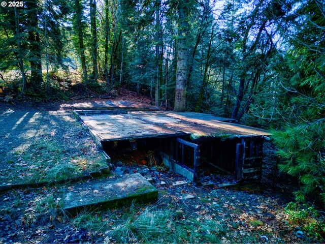 487 Montgomery Ave, Glendale, OR 97442 - view of swimming pool featuring a forest view