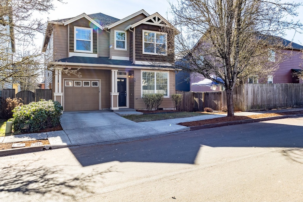 view of front of home with a garage