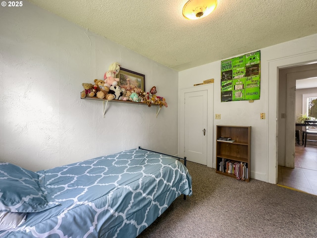 217 N Main St, Halfway, OR 97834 - carpeted bedroom with a textured ceiling