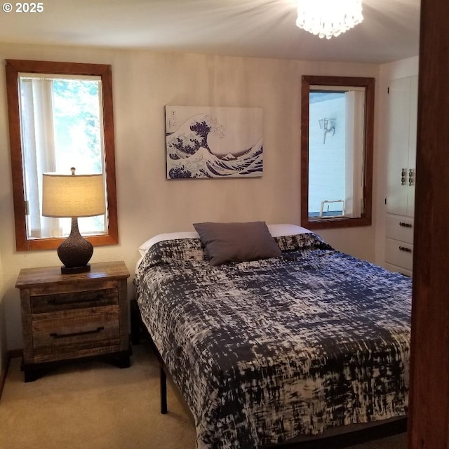 bedroom with light carpet