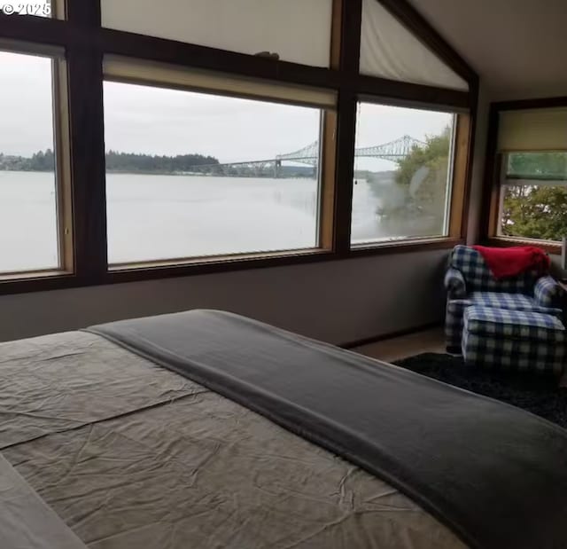 bedroom with a water view