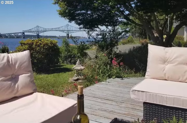 deck featuring a water view