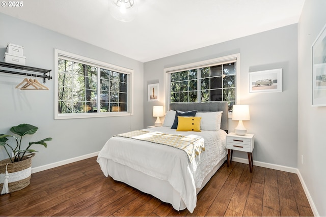 bedroom featuring dark hardwood / wood-style flooring