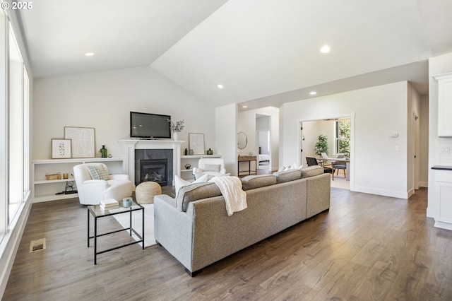 31870 SE Grace St, Gresham, OR 97080 - living room featuring lofted ceiling, dark wood finished floors, a fireplace, and recessed lighting