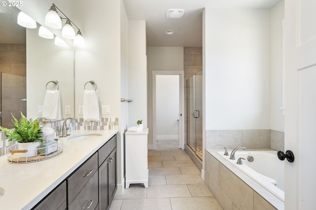 31870 SE Grace St, Gresham, OR 97080 - bathroom with double vanity, a shower stall, a garden tub, and tile patterned floors