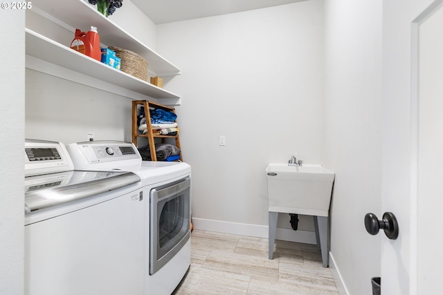 31870 SE Grace St, Gresham, OR 97080 - washroom featuring washer and clothes dryer and light wood-type flooring