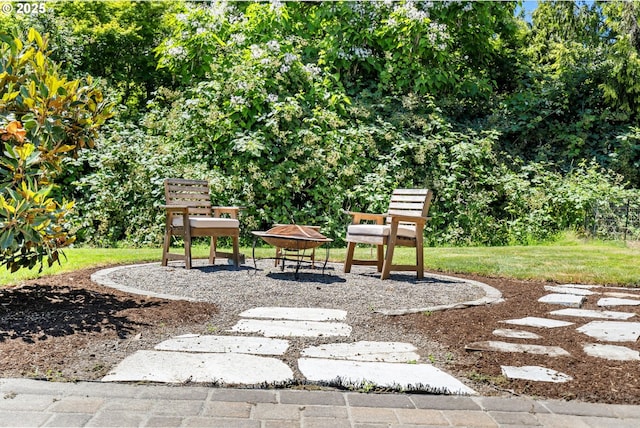 31870 SE Grace St, Gresham, OR 97080 - view of green lawn with an outdoor fire pit and a patio area