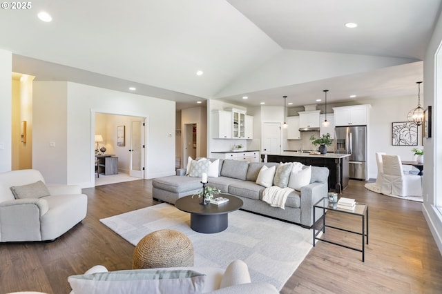 31870 SE Grace St, Gresham, OR 97080 - living area with vaulted ceiling, dark wood-style floors, and recessed lighting