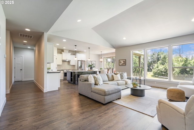 31870 SE Grace St, Gresham, OR 97080 - living area featuring dark wood-style flooring, recessed lighting, and vaulted ceiling