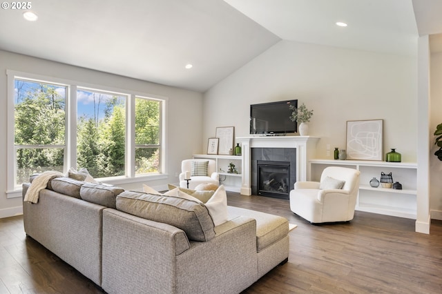 31870 SE Grace St, Gresham, OR 97080 - living area with vaulted ceiling, dark wood-style floors, a fireplace, and recessed lighting