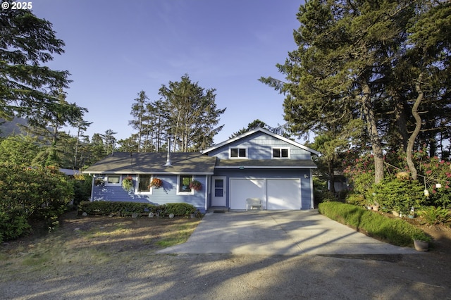 5825 Roma Ave, Cloverdale, OR 97112 - view of front facade featuring driveway and an attached garage