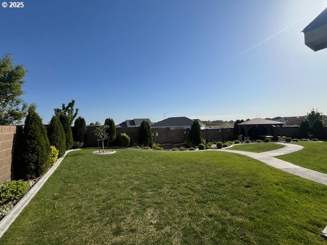 101 Rome St, Boardman, OR 97818 - view of yard with a fenced backyard