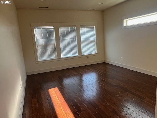 101 Rome St, Boardman, OR 97818 - empty room featuring baseboards and dark wood finished floors