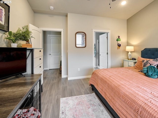 bedroom with light wood-type flooring