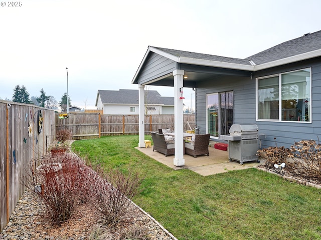 view of yard with outdoor lounge area and a patio