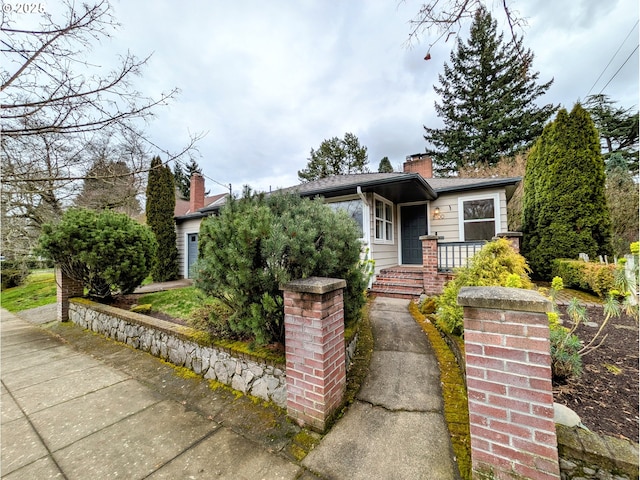 view of front of house with a chimney