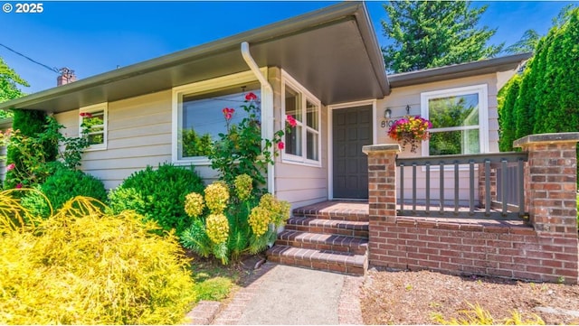 entrance to property with a porch