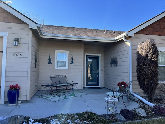 doorway to property featuring a patio area