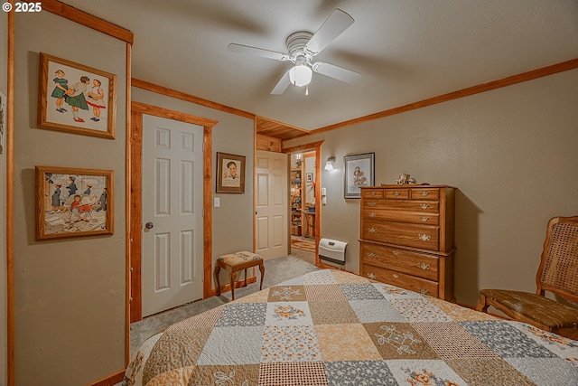 bedroom featuring ornamental molding, light carpet, and ceiling fan