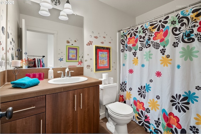 7869 NE Rockne Way, Hillsboro, OR 97006 - bathroom with vanity, tile patterned floors, and a shower with curtain