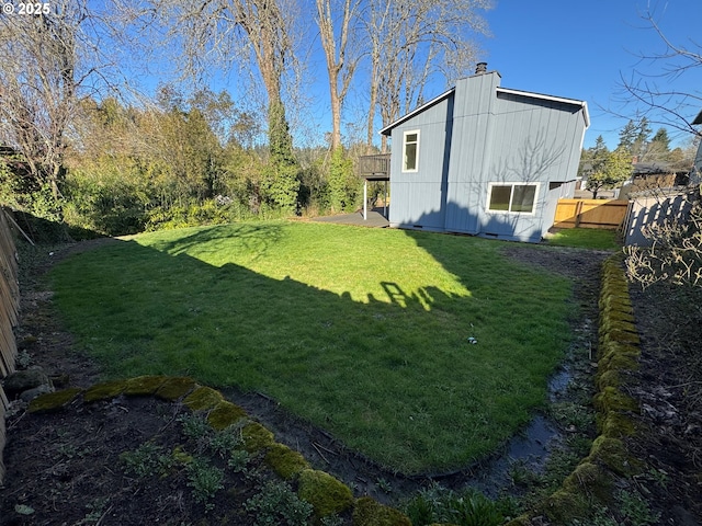 view of yard featuring fence