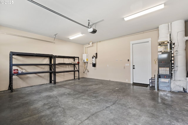 3935 NW 75th Ave, Camas, WA 98607 - garage featuring a garage door opener and a central vacuum unit