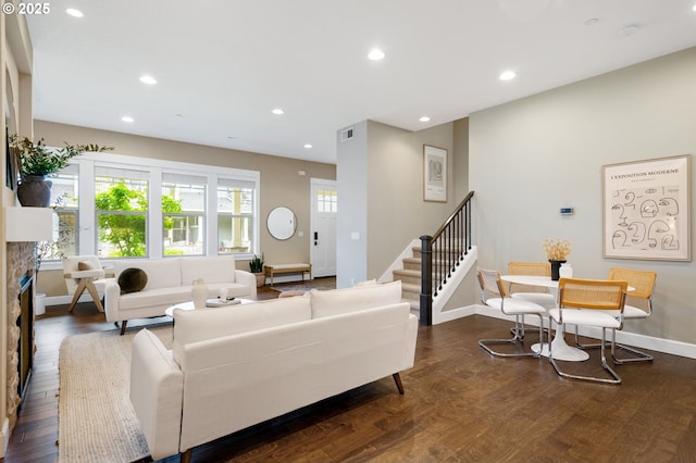 3935 NW 75th Ave, Camas, WA 98607 - living room featuring recessed lighting, dark wood-style flooring, stairway, and a fireplace