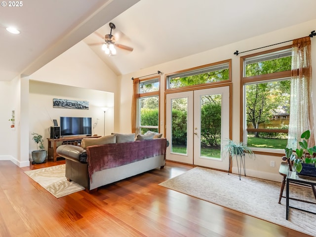 15700 SW Division St, Beaverton, OR 97007 - living area with plenty of natural light, ceiling fan, lofted ceiling, wood finished floors, and french doors