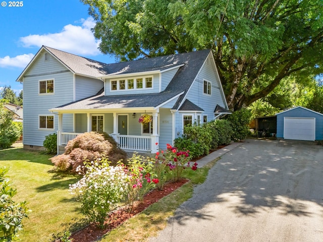 15700 SW Division St, Beaverton, OR 97007 - view of front of home featuring covered porch, a detached garage, an outdoor structure, asphalt driveway, and a front lawn