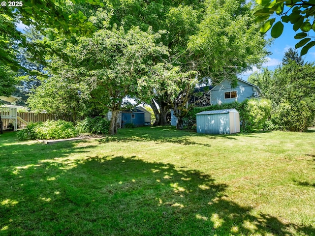 15700 SW Division St, Beaverton, OR 97007 - view of grassy yard featuring a storage shed
