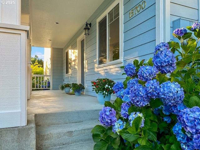 15700 SW Division St, Beaverton, OR 97007 - view of exterior entry featuring a porch