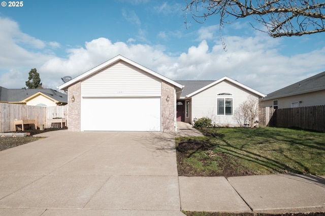 ranch-style home featuring concrete driveway, an attached garage, fence, a front lawn, and brick siding