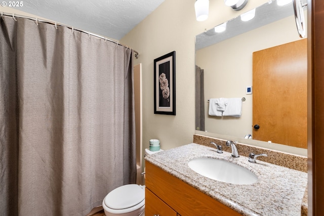 full bathroom with vanity, a textured ceiling, toilet, and shower / bathtub combination with curtain