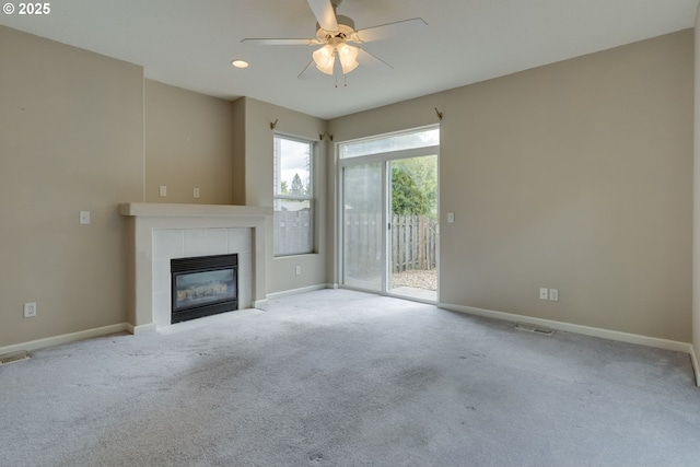 4338 NE 76th Ave, Portland, OR 97218 - unfurnished living room with carpet floors, a fireplace, a ceiling fan, and recessed lighting