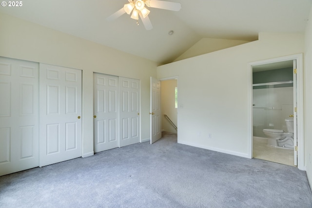 4338 NE 76th Ave, Portland, OR 97218 - unfurnished bedroom with carpet floors, two closets, lofted ceiling, connected bathroom, and ceiling fan