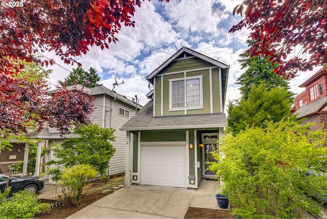 4338 NE 76th Ave, Portland, OR 97218 - view of front of home with a shingled roof, driveway, and an attached garage