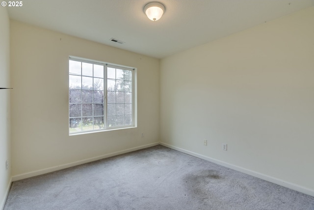 4338 NE 76th Ave, Portland, OR 97218 - carpeted empty room with baseboards