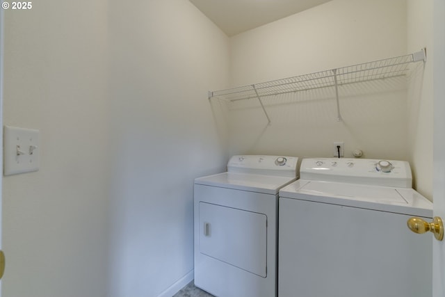 4338 NE 76th Ave, Portland, OR 97218 - laundry area with separate washer and dryer and baseboards
