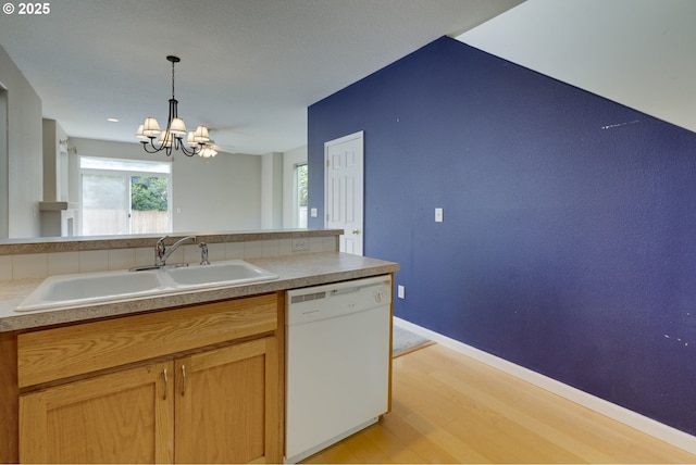 4338 NE 76th Ave, Portland, OR 97218 - kitchen featuring dishwasher, a chandelier, light wood-type flooring, and pendant lighting