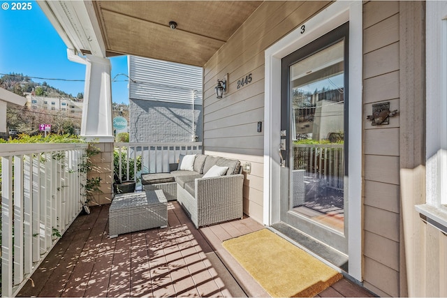 view of patio featuring a porch and an outdoor hangout area