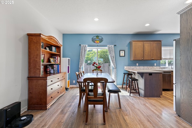 25092 Amber Ct, Veneta, OR 97487 - dining space with light wood-style flooring, baseboards, and recessed lighting