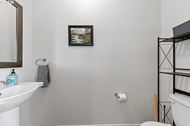 25092 Amber Ct, Veneta, OR 97487 - half bathroom featuring toilet and a sink
