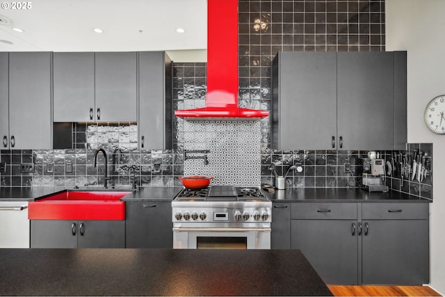 700 Washington St Unit 1125, Vancouver, WA 98660 - kitchen with high end stainless steel range, gray cabinets, dark countertops, and recessed lighting