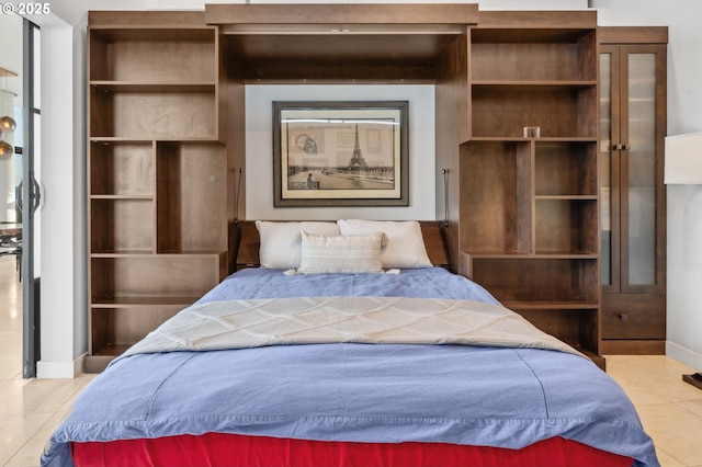 700 Washington St Unit 1125, Vancouver, WA 98660 - bedroom with tile patterned floors and baseboards