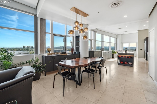 700 Washington St Unit 1125, Vancouver, WA 98660 - dining space featuring light tile patterned flooring, a chandelier, and recessed lighting