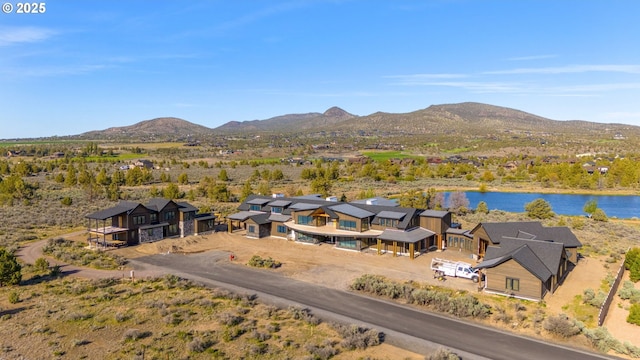 17097 SW Lago Vista Dr, Powell Butte, OR 97753 - drone / aerial view of a water and mountain view