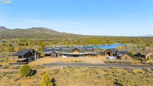 17097 SW Lago Vista Dr, Powell Butte, OR 97753 - aerial view of property and surrounding area with a water and mountain view