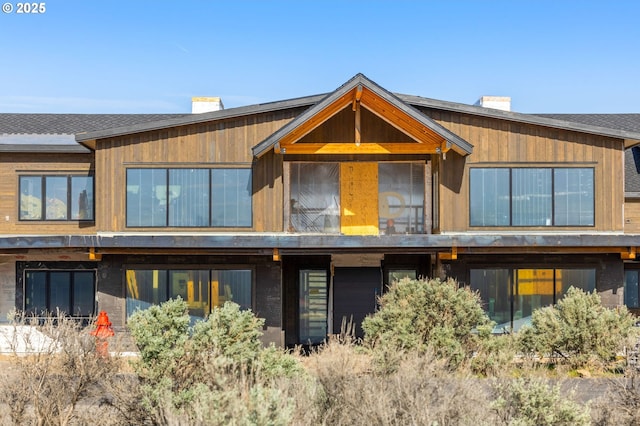 17097 SW Lago Vista Dr, Powell Butte, OR 97753 - view of front facade with a chimney
