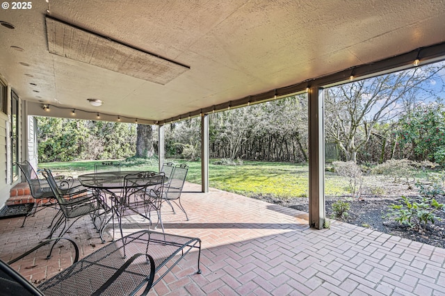 view of patio with outdoor dining area