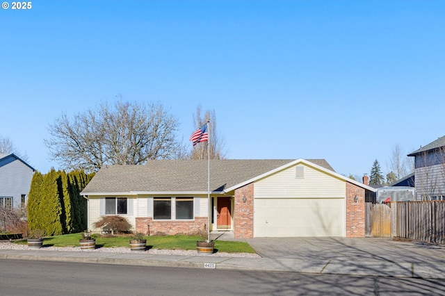 ranch-style house featuring a garage